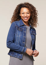 Front view of the EQL In Motion Jean Jacket in Midnight Wash, highlighting the modern jean jacket styling with a classic button front and point collar.